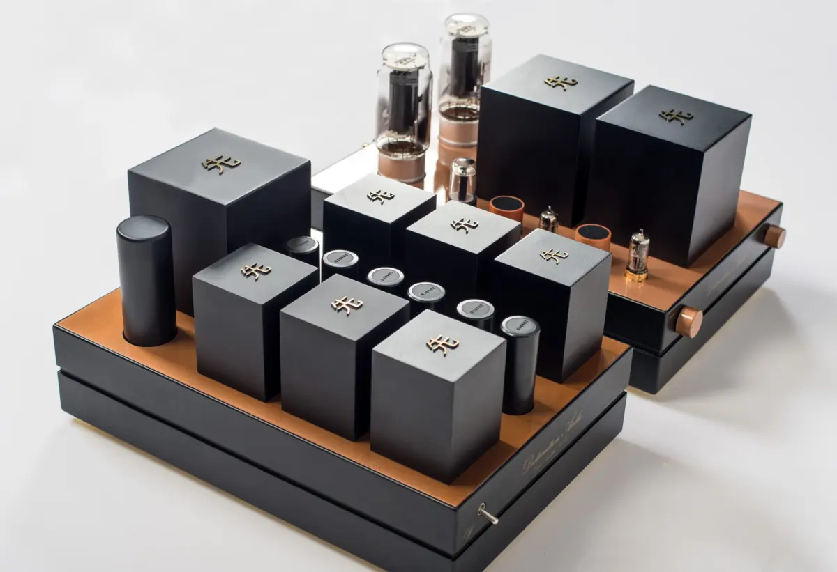 Destination Audio GM70 integrated amplifier and power supply seen from above on a white background