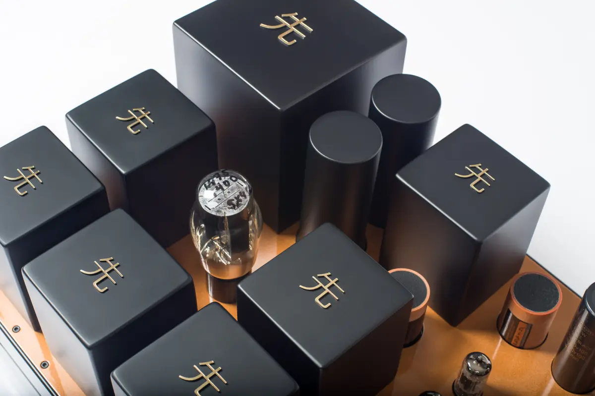 Close-up of transformer housings and a vacuum tube on the Destination Audio WE417A phono stage